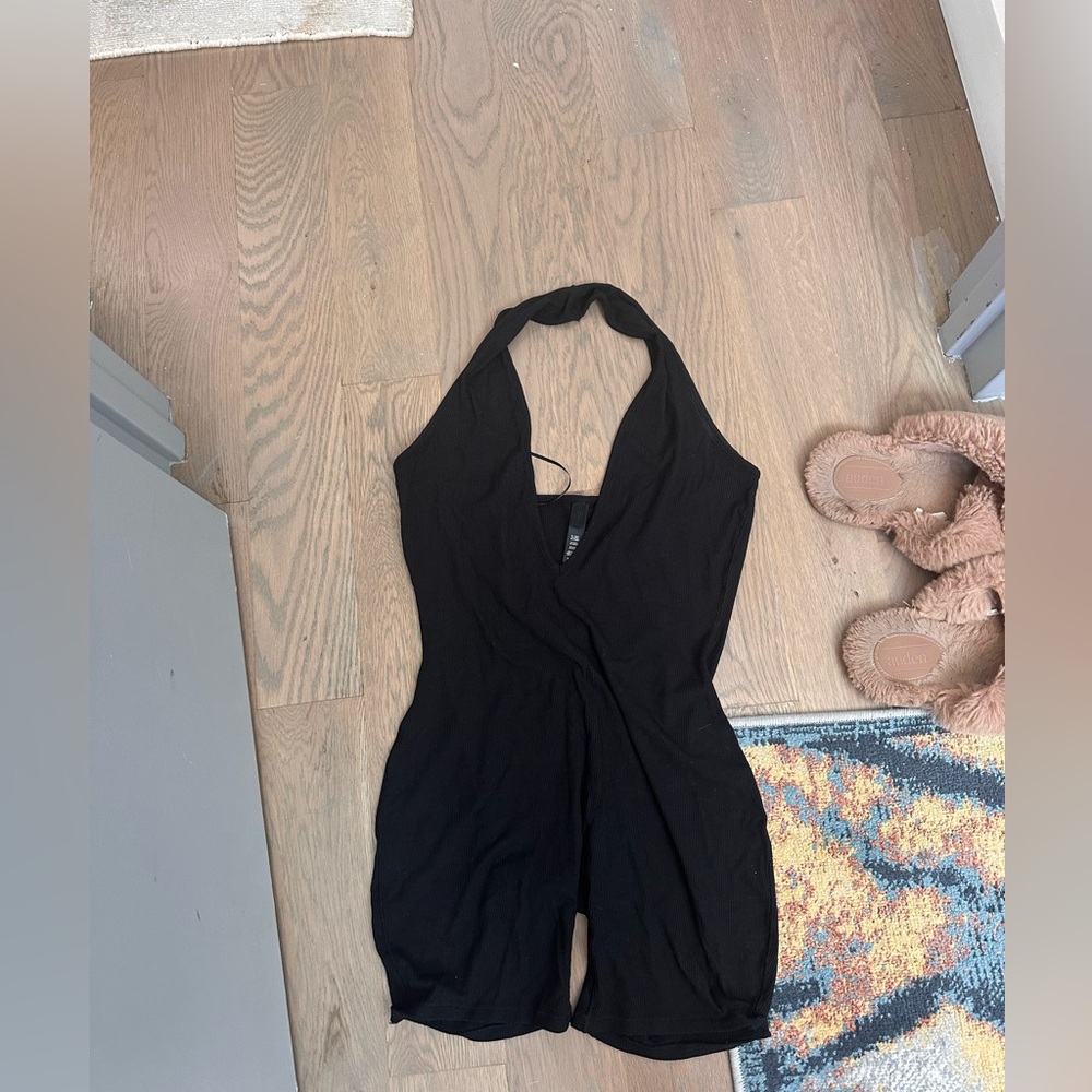 Skins black low plunge bodysuit